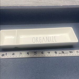 Rae ceramic dish about 11 inches long and 3 1/2 inches wide